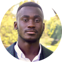 Sonny headshot outside in a park